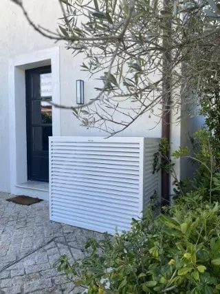 aesthetic casing for heat pump or outdoor air conditioner